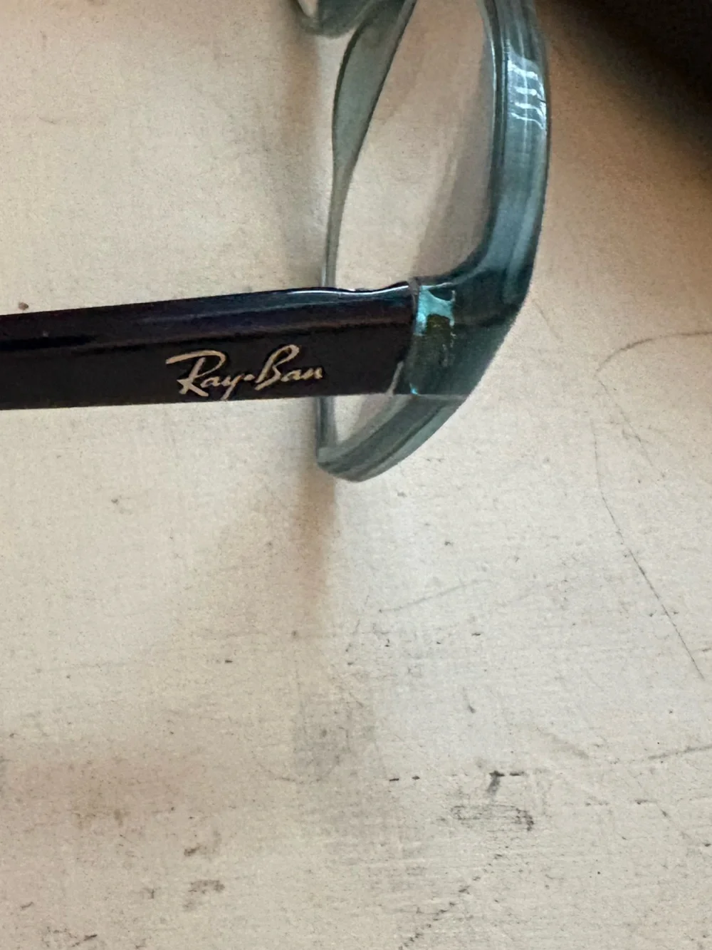 Ray-Ban Black Case with Green-Tinted Frame Glasses